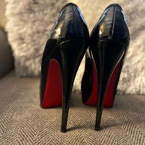 Christian Louboutin asteroid pumps
